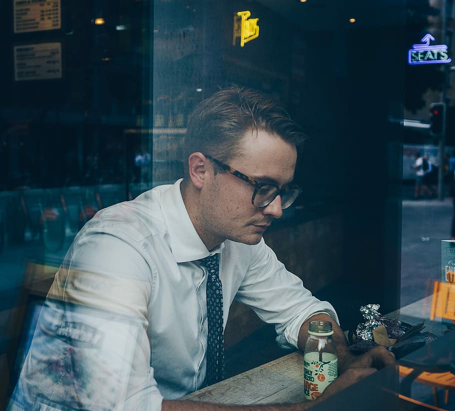 man in white dress shirt sitting inside the restaurant, men, people HD wallpaper