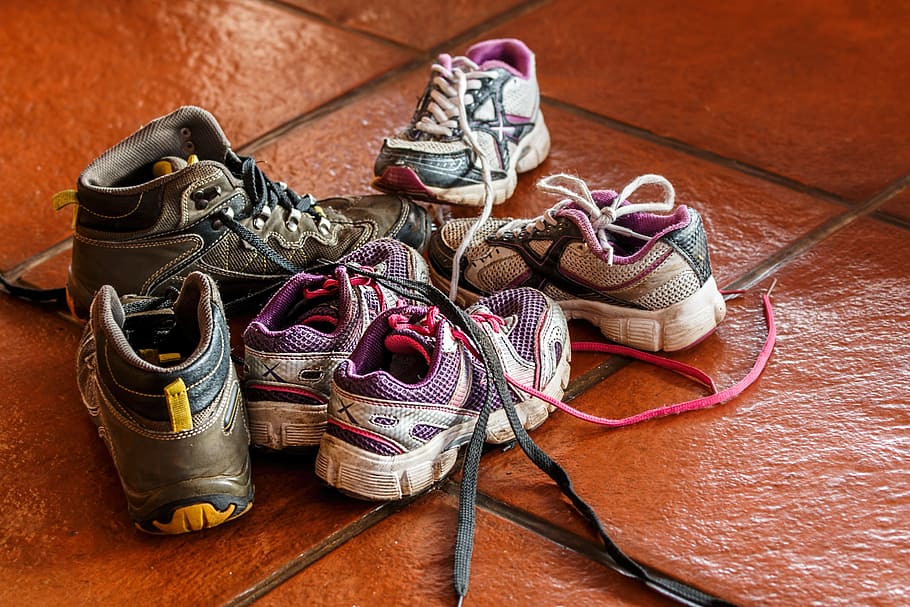 three pairs of assorted-color running shoes, children's shoes