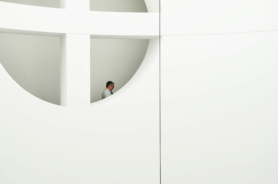 man near white window, man standing on building, modern, clean HD wallpaper