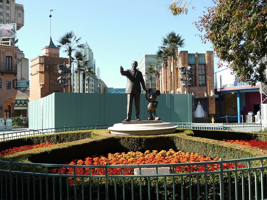 man and Mickey Mouse statue, walt disney, art, sculpture, disneyland