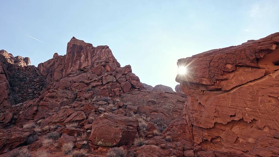 photo of rocky mountain, rock formation, cliff, sunlight, blue HD wallpaper