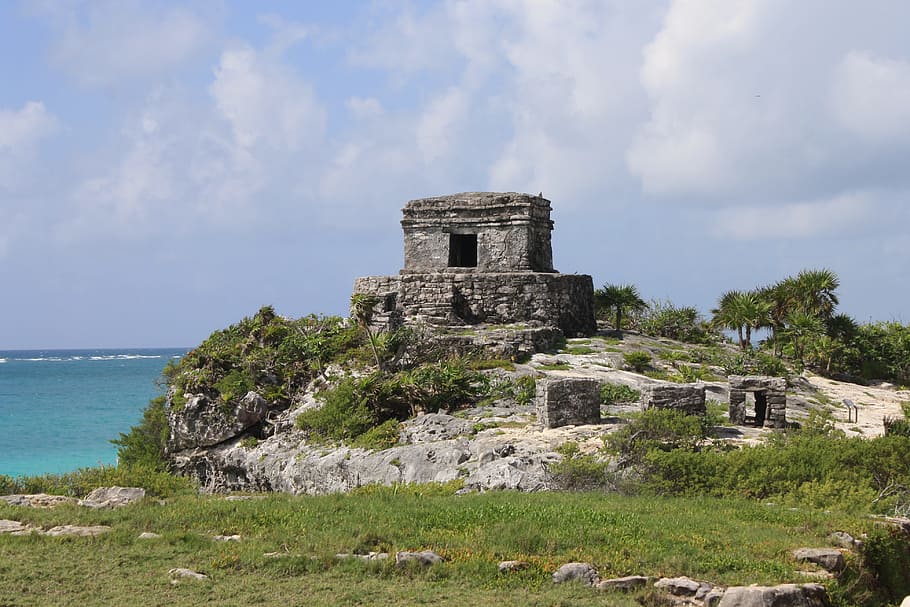 gray concrete building near green trees at daytime, tulum, mexico HD wallpaper