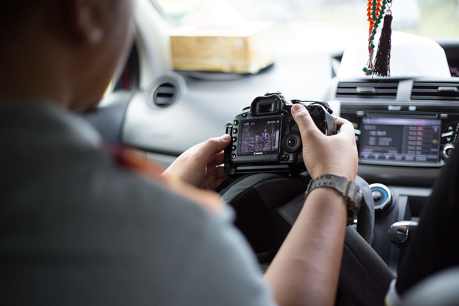 Midsection of Man Using Mobile Phone, camera, canon, car, dashboard HD wallpaper