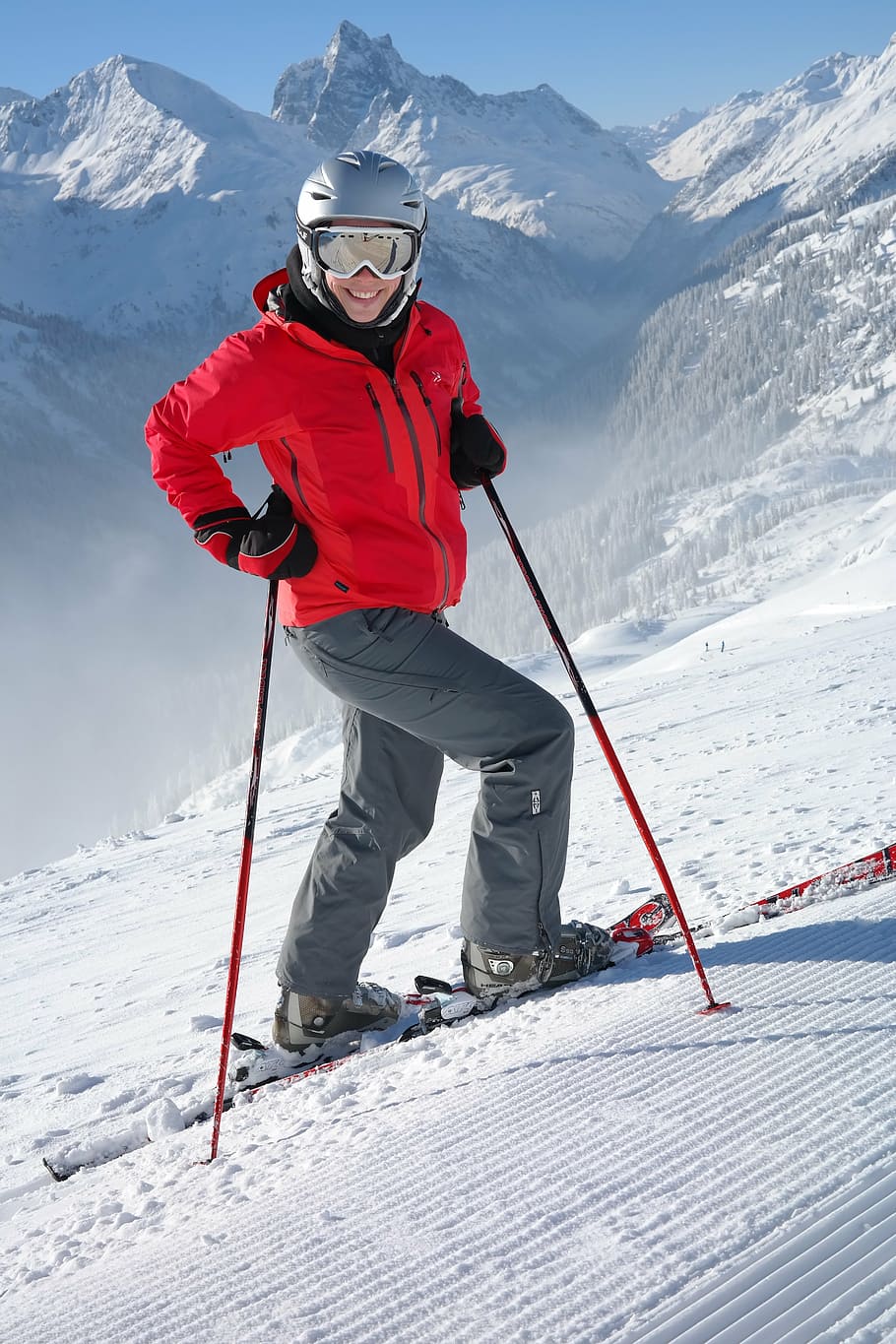 person in red jacket doing snow ski while holding ski poles during daytime, HD wallpaper