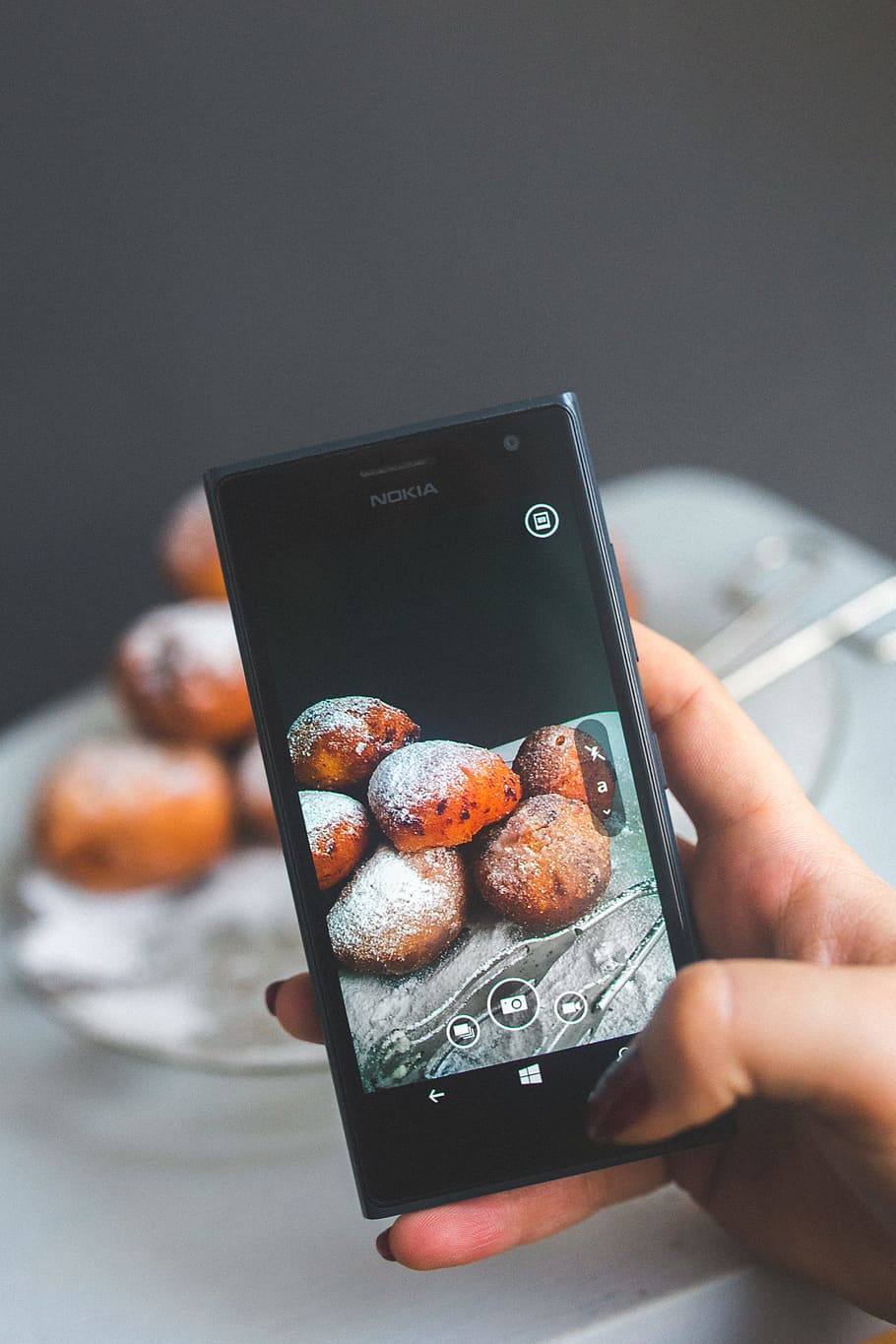 Woman hand taking picture of doughnuts, camera, donut, mobile phone, HD wallpaper