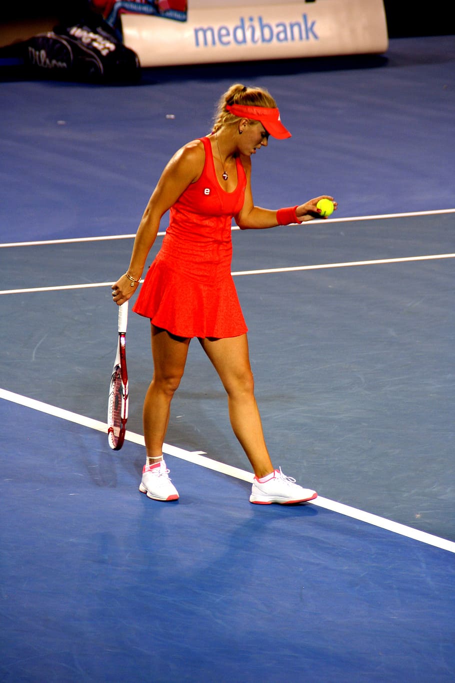 female tennis player performing serve, caroline wozniacki, woman