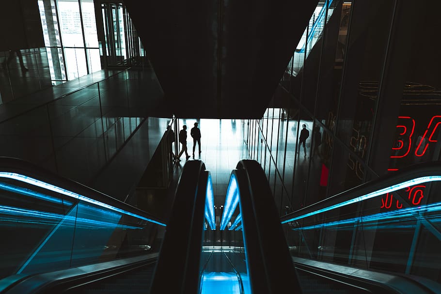 person standing near empty escalator, time lapse photography of escalator HD wallpaper