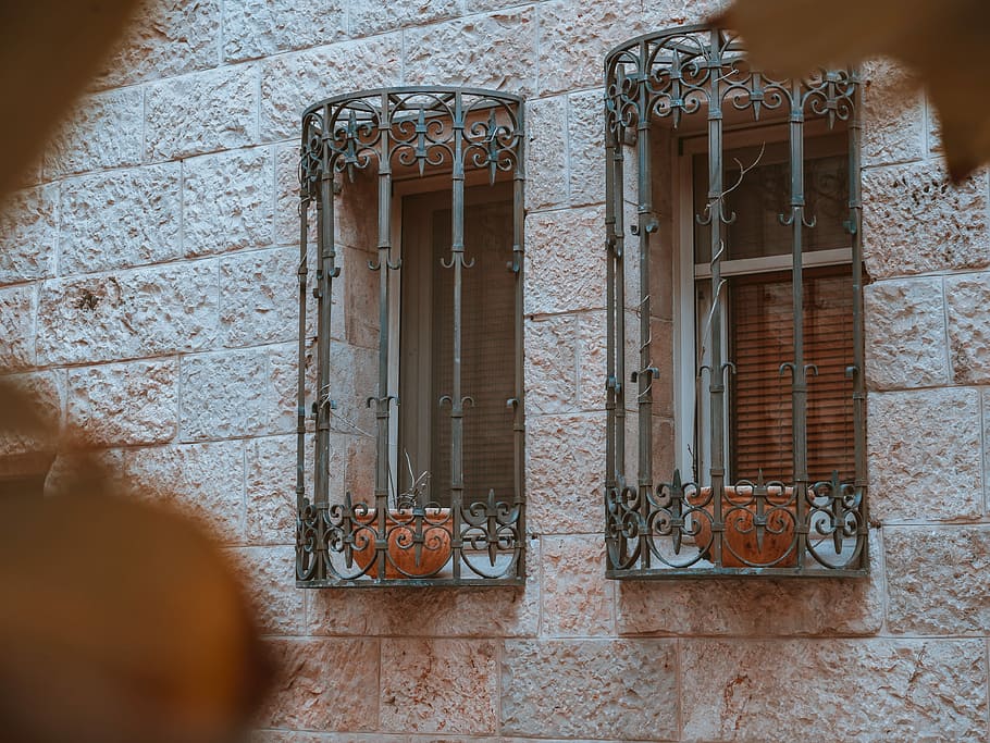 two gray steel framed windows, two brown flower pots on gray metal window grilles HD wallpaper