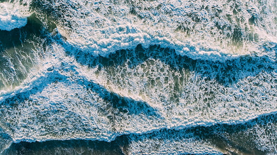 closeup photo of water rushing in to the shoreline, nature HD wallpaper