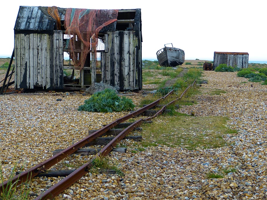 brown railroad surrounded by rocks and stones, dungeness, romney marsh
