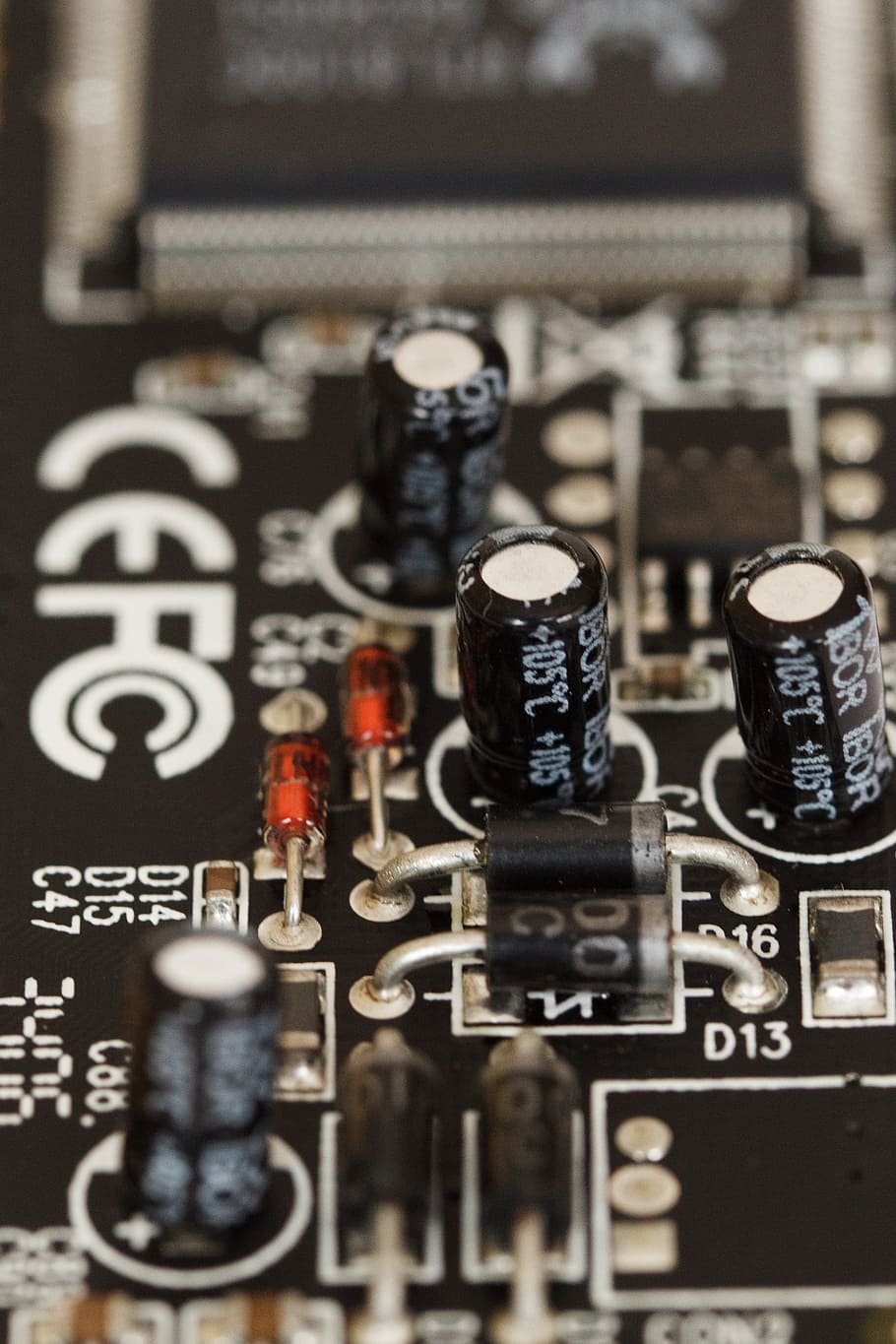 selective focus photography of brown motherboard with four capacitors, HD wallpaper