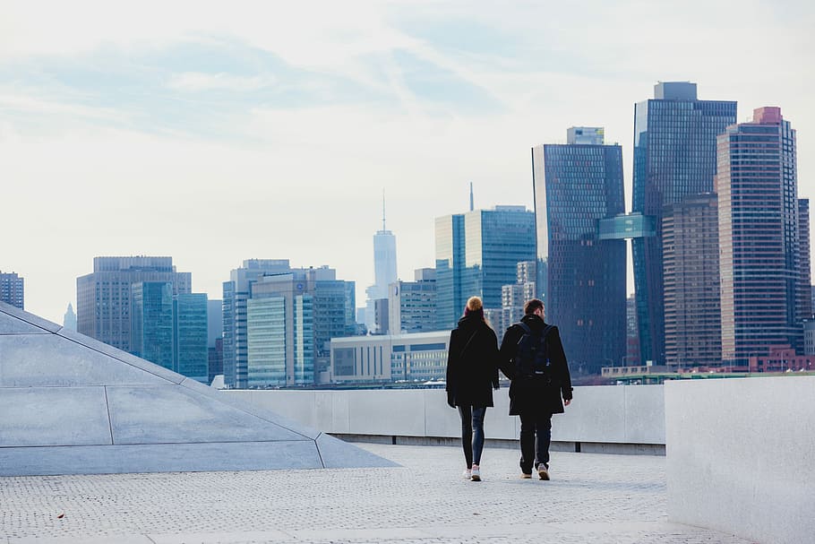 two people walking on rooftop, man and woman walking on building HD wallpaper