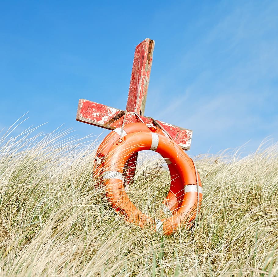 red wooden cross and two orange swim rings, saved, beach, sky HD wallpaper