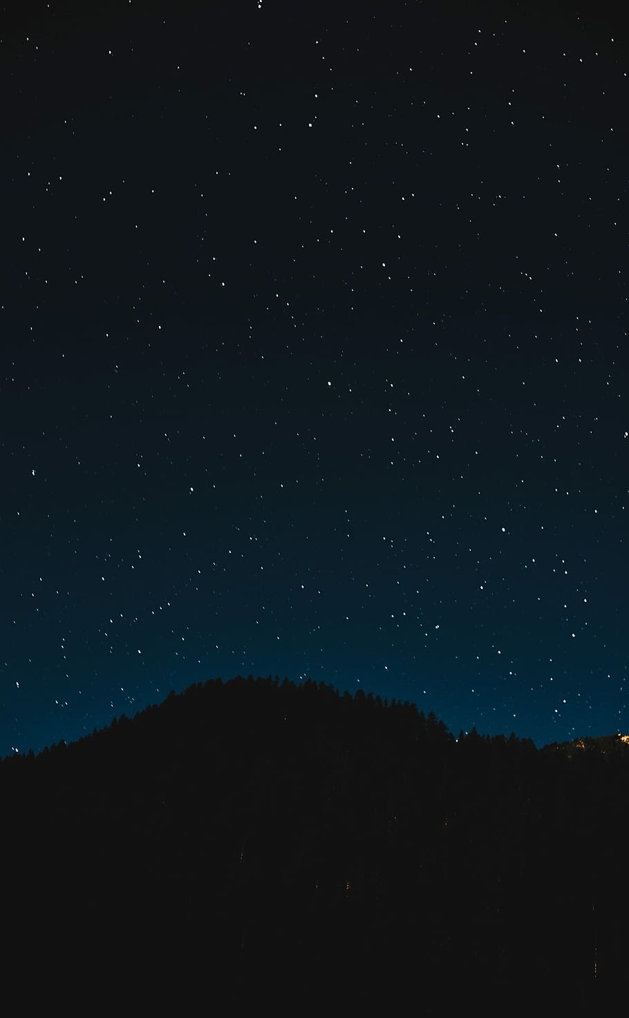 photo of clear sky full of stars, silhouette of mountain, night