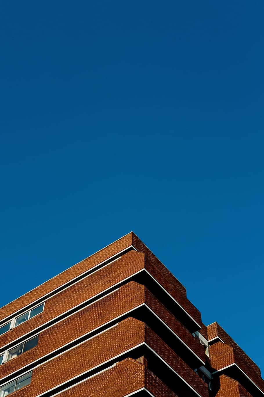 brown building during daytime, brown painted building during daytime HD wallpaper