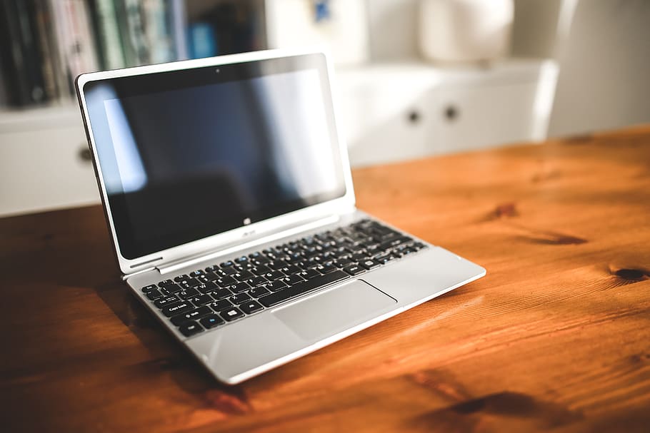 silver laptop computer on brown wooden desk, technology, netbook HD wallpaper