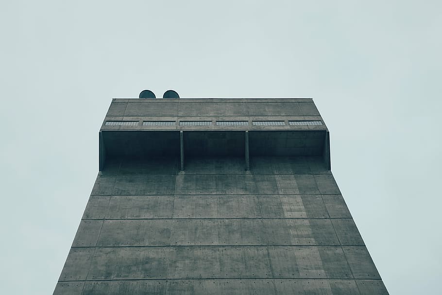 low angle photography of building under white clouds, gray HD wallpaper