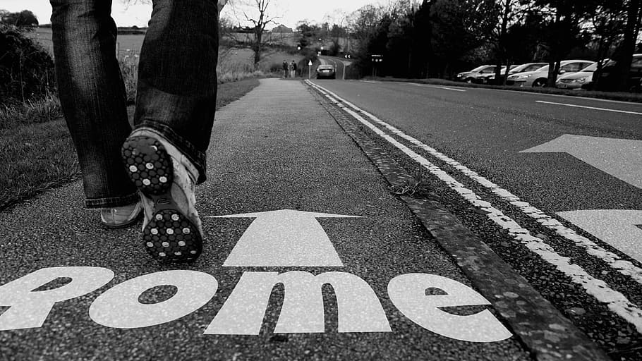 photo of person walking on a road with Rome signage, on foot HD wallpaper