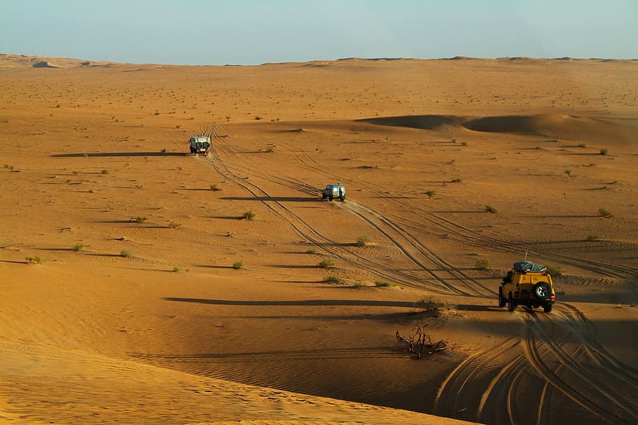 three off-road cars on desert sand, sahara, 4x4, rally off-road