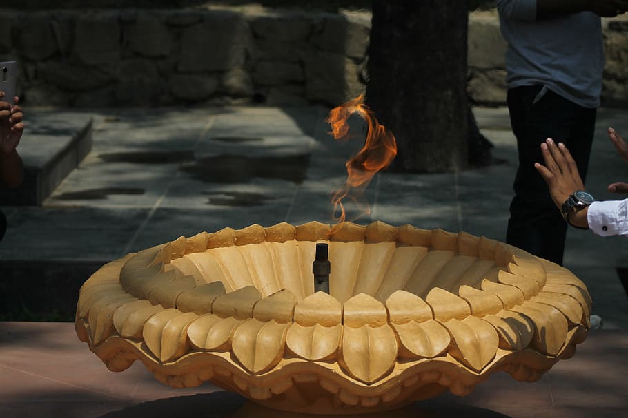 endless fire, burning, focus on foreground, human body part HD wallpaper