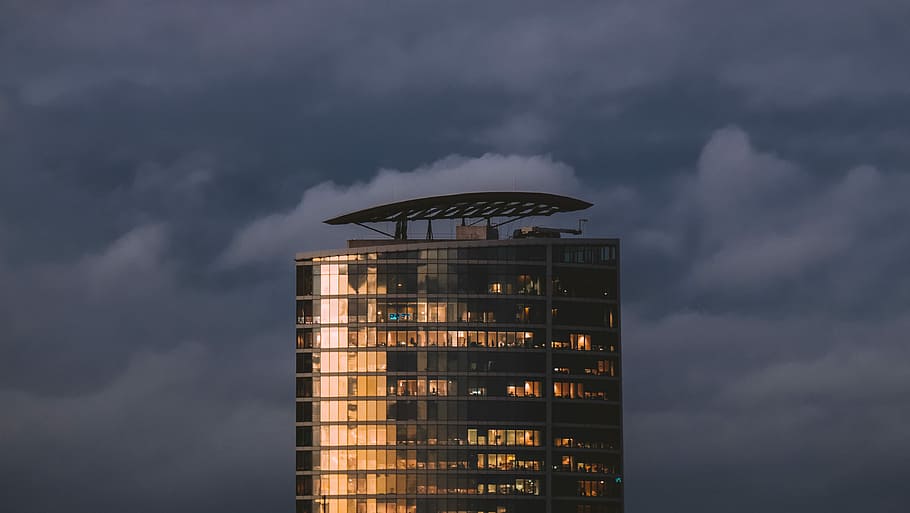 concrete building, worms eye view of gray concrete building under cloudy sky HD wallpaper
