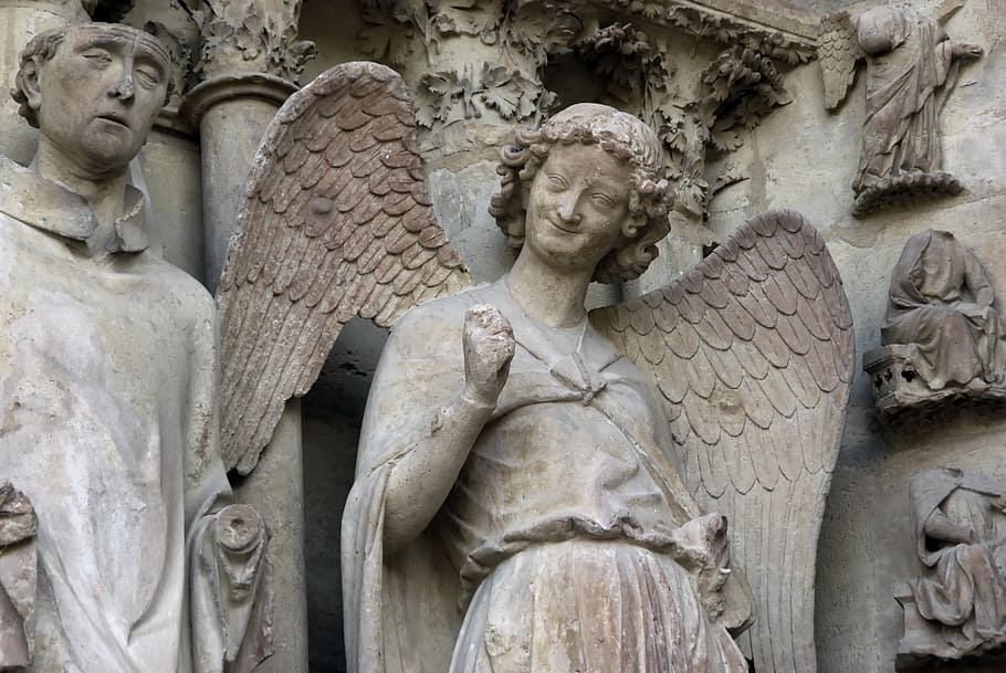 photo of angel statue, reims, cathedral, gothic, smile, sculpture