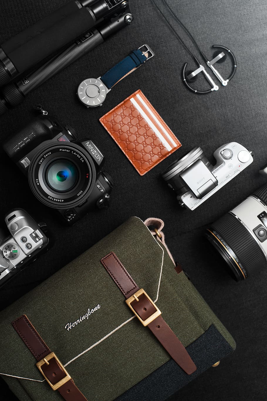black Minolta DSLR camera beside bag on table, sony, iphone, photography themes