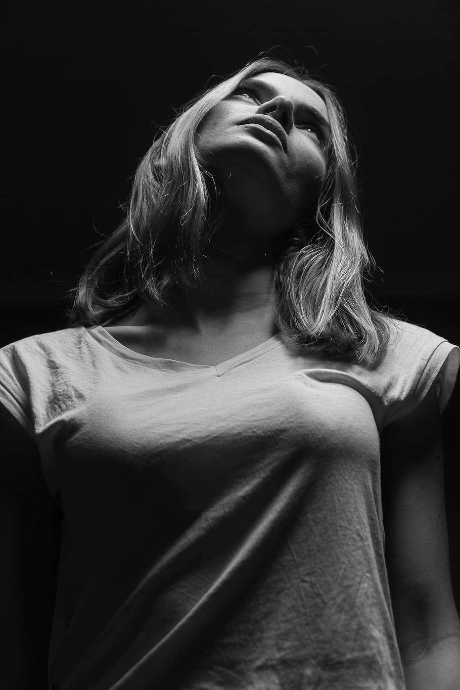 Royalty-Free photo: Grayscale photo of woman wearing button-up top