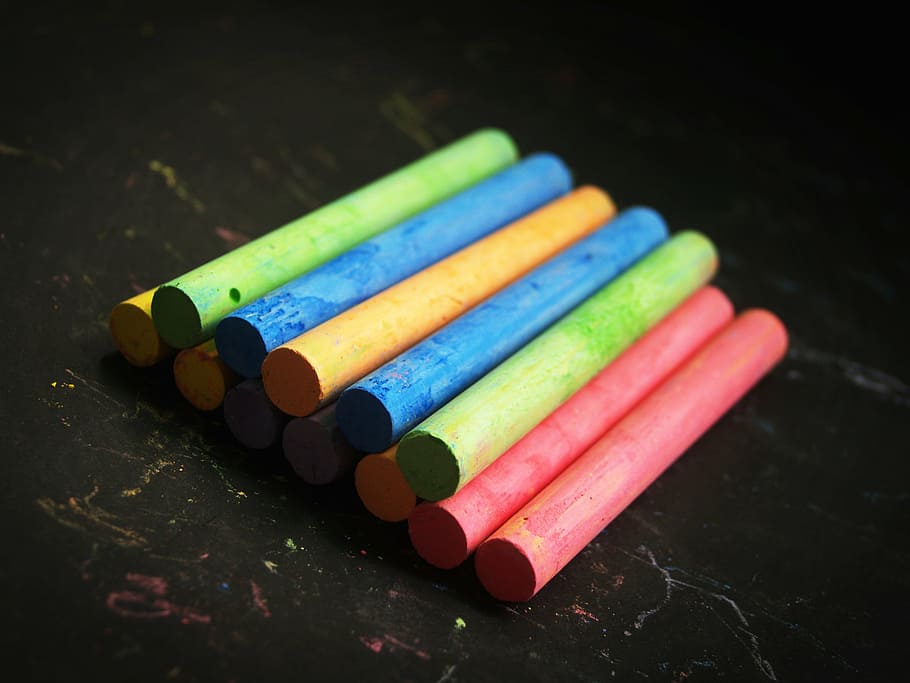 assorted-color chalks, red, teacher, yellow, line, leaf, blackboard