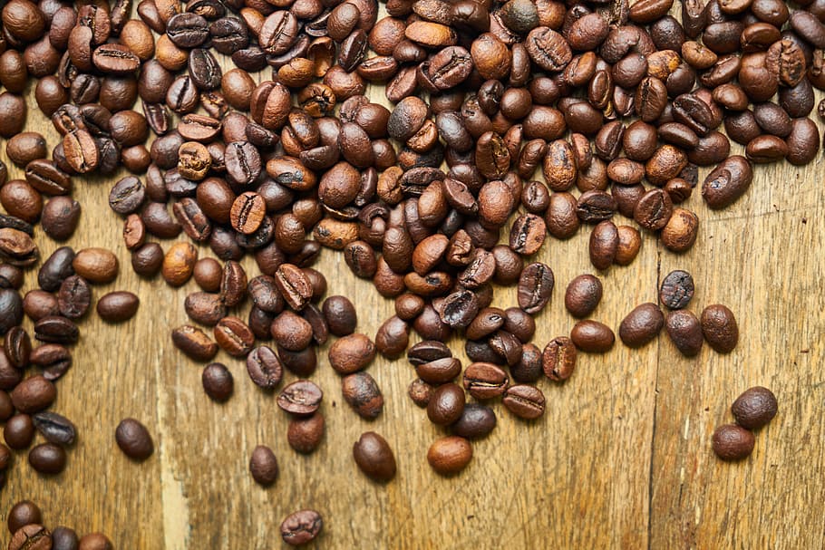 bunch of coffee beans on wooden table, core, seed, kernels HD wallpaper