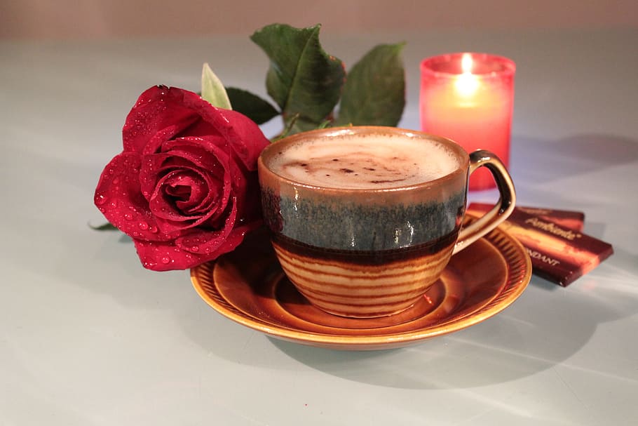 brown ceramic teacup near red rose, coffee, foam, drink, candle HD wallpaper