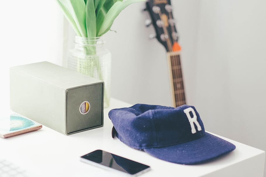 blue fitted cap beside smartphone on table, Iphone, Office, Mobile HD wallpaper
