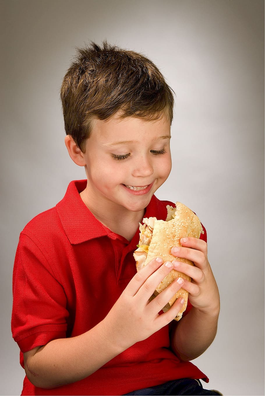 boy holding a sandwich, child, eating, hoagie, grinder, blimpie, HD wallpaper