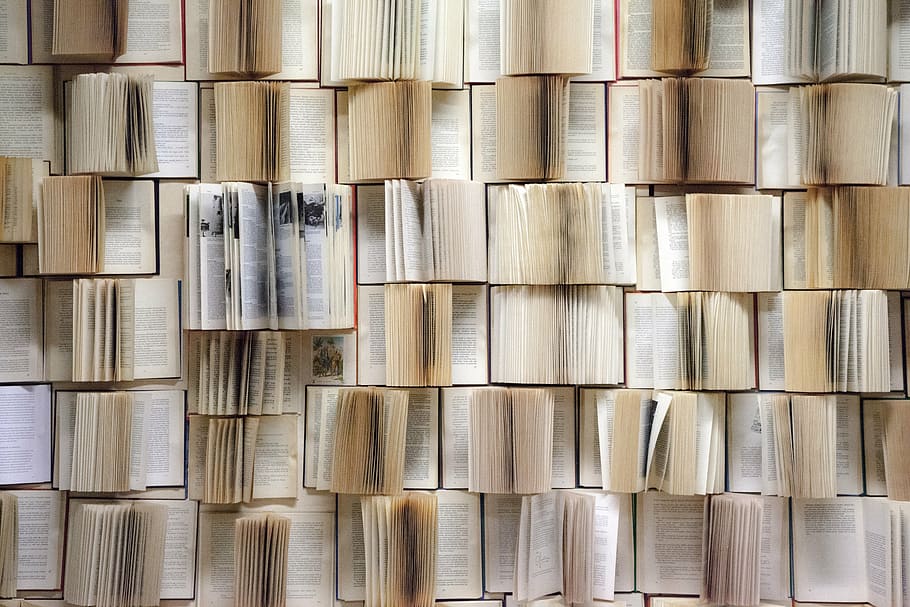pile of opened books, book wall, decorative, interior, interior wall