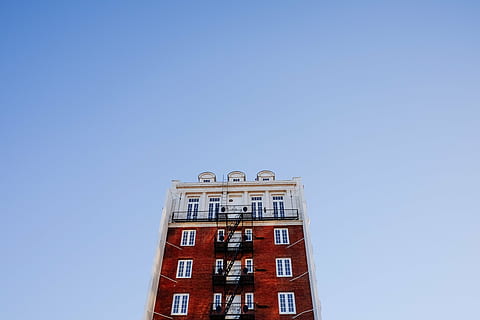 low angle photography of white and brown building, fire escape HD wallpaper