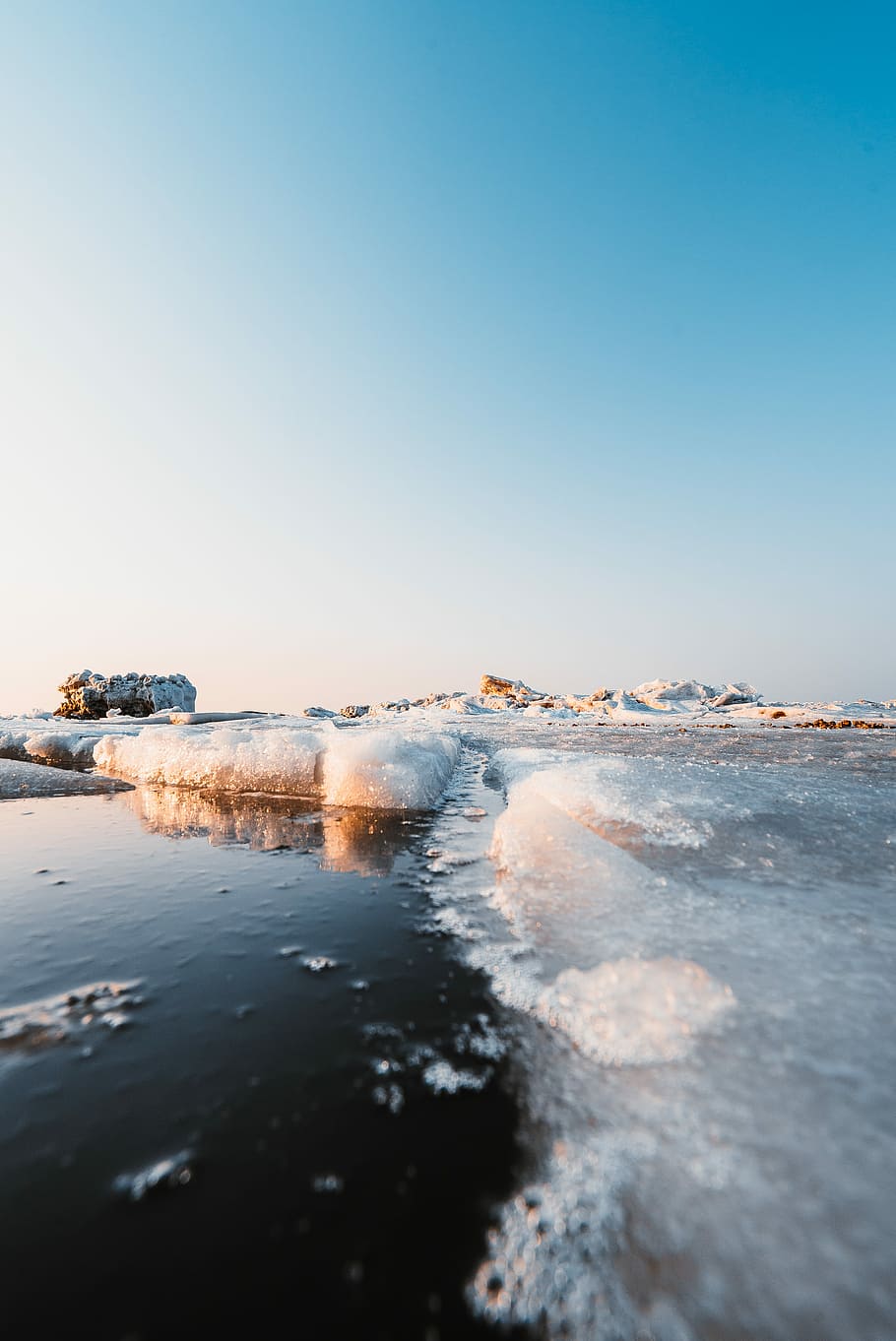 ice on water near stones, photo of iceberg during daytime, cold HD wallpaper