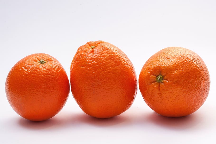 three oranges on white board, bahia orange, navel oranges, citrus sinensis, HD wallpaper