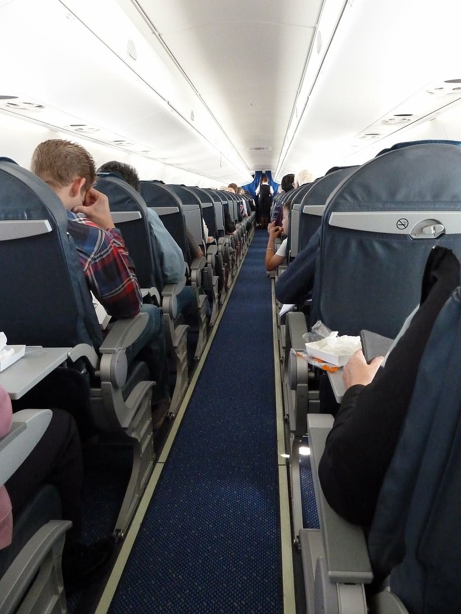 people inside airplane, aircraft, aircraft cabin, passengers
