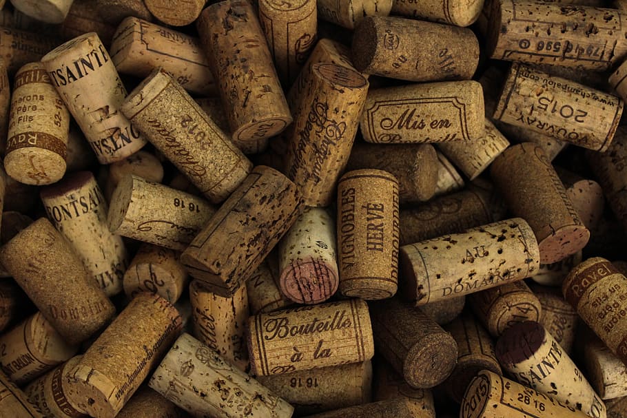 assorted printed cork stoppers, wine cork lot top-view photography, HD wallpaper