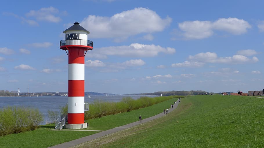 people walking near lighthouse during daytime, river, river landscape HD wallpaper