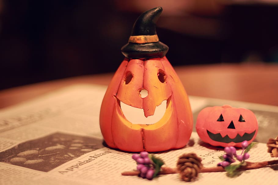 two pumpking lighting ornaments on newspaper, halloween, autumn HD wallpaper