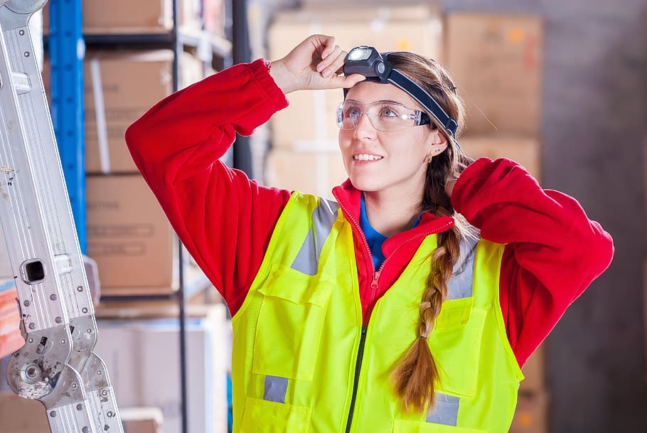 photo of woman in black headlamp, red long sleeve zip up work suit and yellow work vest HD wallpaper