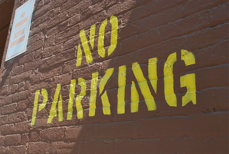 No Parking sign on brown concrete wall, bricks, text, brick wall HD wallpaper