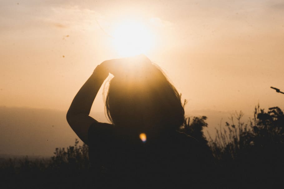 Chasing Sunset, silhouette of woman holding her head during daytime, HD wallpaper