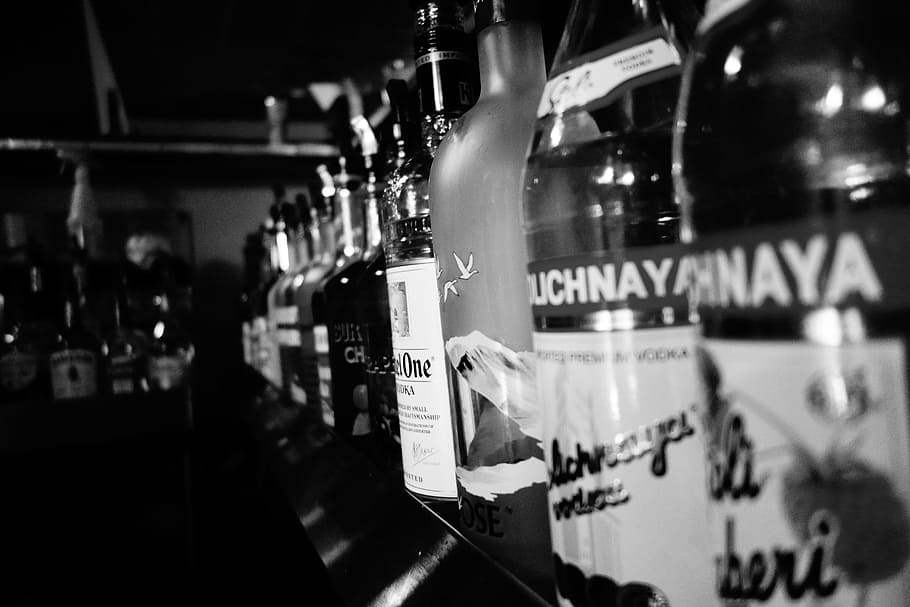 grayscale photography of labeled bottles, Alcohol, Vodka, Stoli HD wallpaper
