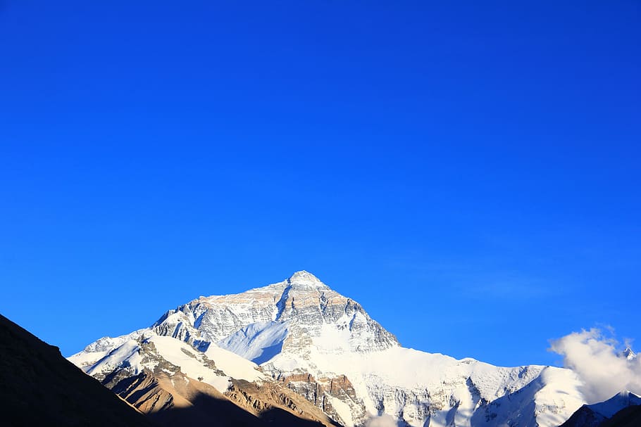 worm's-eye view of mountain under blue sky, Tibet, Mount Everest