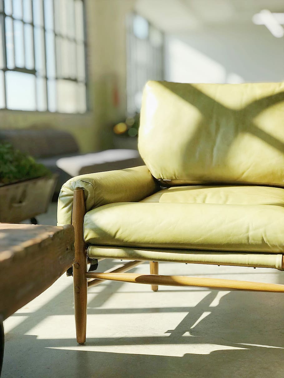 yellow leather sofa near window, selective focus photography of yellow leather padded sofa HD wallpaper