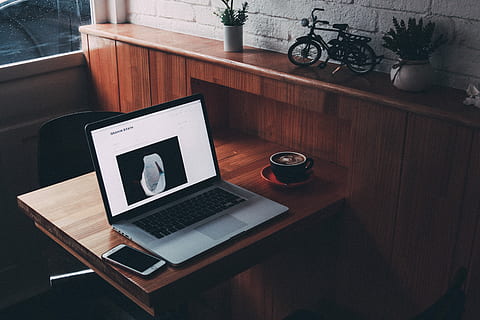 MacBook Pro turned on, MacBook Pro on table, rainy day, iphone HD wallpaper
