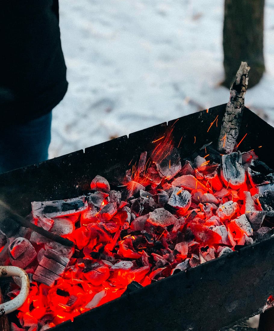 black metal case with charcoal, heated charcoal near white field HD wallpaper