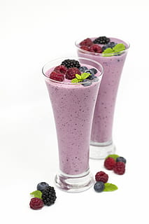 two glass of raspberry shakes against white background, Smoothie HD wallpaper